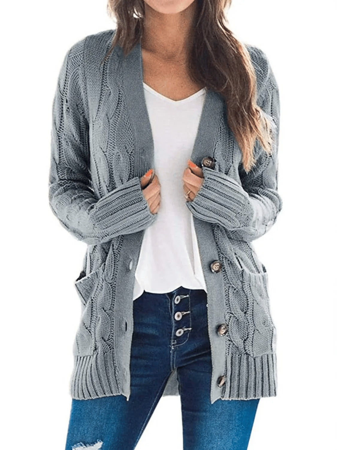 Damesvest voor de herfst met lange mouwen, gebreid en met knopen
